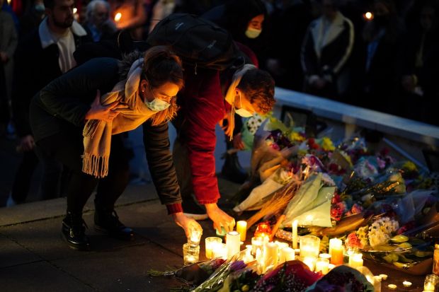 Floral tributes and candles are left after a vigil for Ashling Murphy outside the London Irish Centre in Camden. Photograph: Dominic Lipinski/PA Wire