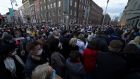 People gather for a vigil at Leinster House, Dublin, for the murdered Ashling Murphy. Thousands of people attended vigils and memorials for the school teacher and musician over the weekend. Photograph: PA 
