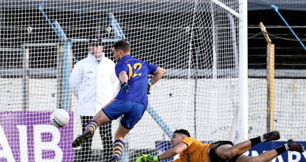 St. Finbarrs’ Enda Dennehy scores his side’s second goal. Photograph: Laszlo Geczo/Inpho