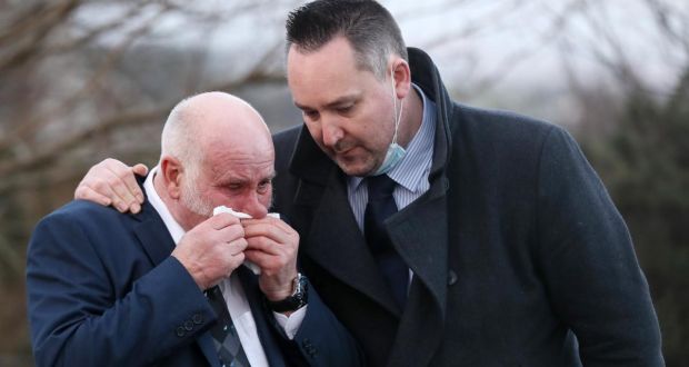Survivor Harry King is comforted at the memorial. Photograph: Jonathan Porter/PressEye