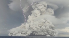 Tonga volcano: ash spews before eruption that caused tsunami