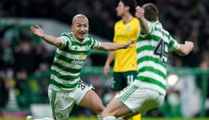 Celtic’s Daizen Maeda  celebrates with James Forrest after scoring his side’s opening goal in the Scottish Premiership match against Hibernian at Celtic Park. Photograph: Andrew Milligan/PA Wire