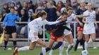 Trinity Rodman  of Washington Spirit dribbling between  Chicago Red Stars players during  a  NWSL Championship match in Louisville, Kentucky. Photograph: Tim Nwachukwu/Getty Images