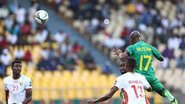 Zimbabwe forward Knowledge Musona heads home his side’s opening goal during the Africa Cup of Nations Group B game against Guinea at Stade Ahmadou Ahidjo in Yaounde, Cameroon. Photograph: Kenzo Tribouillard/AFP via Getty Images