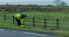 Gardaí carry out searches near the home of a man in his 70s who was badly beaten in Skreen, Co Sligo. Photograph: James Connolly