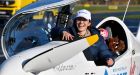 Belgium-British teenage pilot Zara Rutherford smiles as she gets out of the cockpit after landing her Shark ultralight plane  in Kortrijk, Belgium. Photograph: AP Photo/Geert Vanden Wijngaert