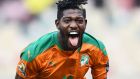  Ivory Coast midfielder Ibrahim Sangaré celebrates scoring his team’s second goal during the Group E Africa Cup of Nations match against Algeria at Stade de Japoma in Douala, Cameroon. Photograph: Charly Triballeau/AFP via Getty Images