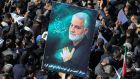 Iranian mourners gather during the final stage of funeral processions for Qasem Soleimani, in his hometown Kerman in January 2020. Photograph: Atta Kenare/AFP via Getty Images