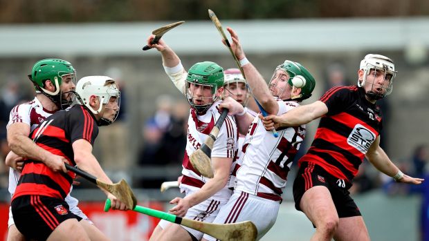 Ballygunner’s Dessie Hutchinson contests with Slaughtneil’s Gerald Bradley and Paul McNeill. Photograph: Ryan Byrne/Inpho