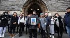 Ulambayar Surenkho holding a photograph of his late wife at the anniversary Mass which was held in St Kevins Church, Harrington Street, Dublin. Photograph Nick Bradshaw for The Irish Times