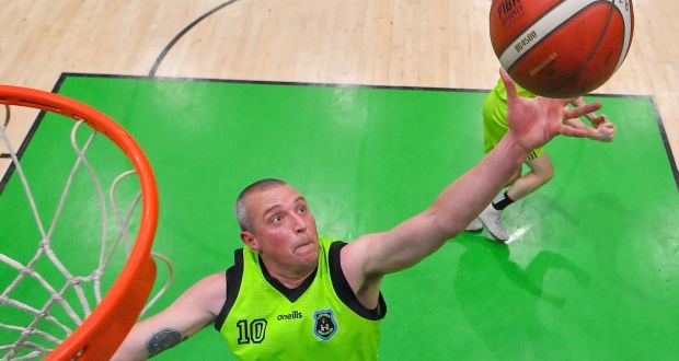 Kieran Donaghy of  Tralee Warriors claiming a rebound during the  Men’s National Cup final  against  Neptune at the National Basketball Arena in Tallaght, Dublin.  Photograph:   Brendan Moran/Sportsfile 