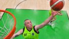Kieran Donaghy of  Tralee Warriors claiming a rebound during the  Men’s National Cup final  against  Neptune at the National Basketball Arena in Tallaght, Dublin.  Photograph:   Brendan Moran/Sportsfile 