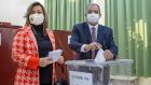 Prime minister Faiz Sucuoglu alongside his wife casts his ballot at a polling station in the northern part of Cyprus’s divided capital Nicosia, in the self-declared Turkish Republic of Northern Cyprus. Photograph: Getty