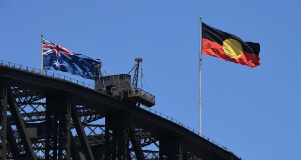 The Australian government said on Tuesday it had acquired copyright to the Aboriginal flag so it can be freely used. Photograph: Getty