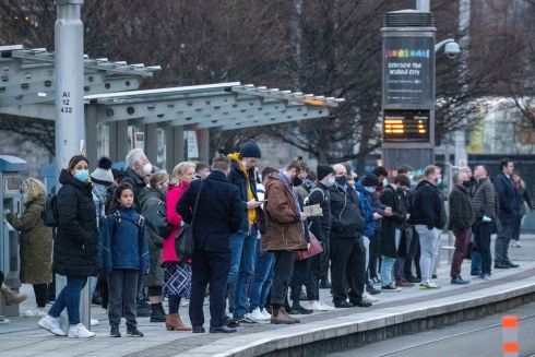 MORNING COMMUTE: People await a Luas at Heuston Station on the Liffey's quays in Dublin in the morning. Photograph: Collins Photos
