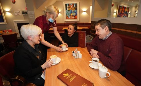 PASSES DROPPED: From left to right; Marie Rice, Lelda Viksna, Lisa McAvoy and Hugh Boyle at the Shelbourne bakery in Newry, Co Down as the requirement for vaccine passports in licensed premises is dropped in Northern Ireland. Photograph: Niall Carson/PA Wire
