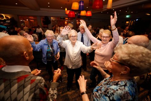 BACK IN ACTION: Maureen Moran, Betty Maher and Teresa Gallagher on the dancefloor at the Friends of the Elderly Christmas lunch, which finally went ahead at the Bonnington Hotel after Covid-19 restrictions were lifted. All participants were antigen tested before the event. Photograph: Alan Betson
