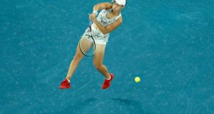  Ash Barty  plays a shot during her Australian Open women’s singles final against America’s Danielle Collins of United States. Photograph: Mark Metcalfe/Getty Images