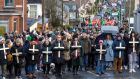In remembrance:  Marching to commemorate the victims of the 1972 Bloody Sunday killings – from the Creggan to the Bogside in Derry. Photograph: PA