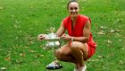 Ash Barty of Australia with the Daphne Akhurst Memorial Cup on Sunday. Photograph: Hamish Blair/AP