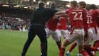 A pitch invader attacks players of Nottingham Forest during the Emirates FA Cup Fourth Round match between Nottingham Forest and Leicester City. Photograph:  James Williamson/AMA/Getty Images