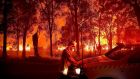 Firefighters battle a bushfire in Bridgetown, Western Australia, where multiple fires were raging across the state prompting evacuations. Photograph: Evan Collis/EPA