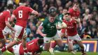 Ireland’s  Tadhg Furlong  is tackled by Wyn Jones of Wales during the  Six Nations match at the  Aviva Stadium. Photograph: Charles McQuillan/Getty Images