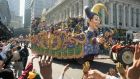Masked characters and elaborate floats are a big part  of Mardi Gras