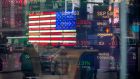 Monitors display stock market information at the Nasdaq MarketSite in New York. Photograph: Michael Nagle/Bloomberg