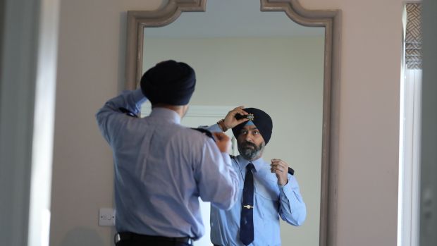 Ravinder Singh Oberoi in his Garda turban: Measures have been taken to encourage minority recruitment, including a change to the Garda uniform policy to allow members wear religious headgear such as hijabs or turbans. Photograph Nick Bradshaw