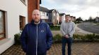 Carlinn Gardens residents Tomás Connolly and Seamus McDermot are two of many in the housing scheme who have found themselves lumbered with big bills. Photograph: Alan Betson