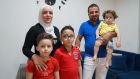 Shahinaz Kassab and Moustafa Mohamad with their children Ahmad (9), Moustafa (10) and Adam (2) at their apartment in Bourj Hammoud in September 2021. The family had just found out that an Irish delegation had returned to complete their interviews