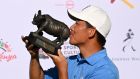  Ashun Wu of China poses with the Magical Kenya Open trophy after his victory at  Muthaiga Golf Club  in Nairobi. Photograph: Stuart Franklin/Getty Images