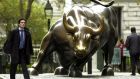 The charging bull statue near the New York Stock Exchange. Photograph: should read Mandel Ngan/AFP/Getty Images