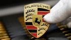 Porsche’s first purpose-built electric car, the Taycan, launched in 2020,  outsold the 911 model in 2021. Photograph:  Thomas Kienzle/AFP via Getty Images