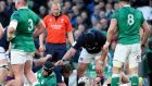 Referee Wayne Barnes looks on as Scotland prop Pierre Schoeman scores a try during Saturday’s Six Nations match at the Aviva Stadium. Photograph: Getty Images
