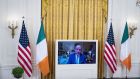 Even the Taoiseach’s detractors would feel sorry for him, with Martin appearing at the White House only as an image on a television screen. Photograph: Al Drago/Bloomberg