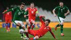 Republic of Ireland’s striker Callum Robinson is tackled by Luxembourg’s defender Enes Mahmutovic during the World Cup qualifier in  Dublin last year. Photograph: Clodagh Kilcoyne/AFP via Getty Images