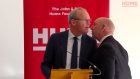 Simon Coveney is interrupted over    a security alert during his speech at a peacebuilding event  at the Houben Centre, Belfast. Photograph: Hume Foundation/PA Wire 