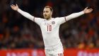 Denmark’s Christian Eriksen celebrates after scoring during the friendly between the Netherlands and Denmark. Photograph: Getty Images 