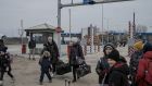 Ukrainian refugees cross the border into Palanca, Moldova, on March 16th. Photograph: Mauricio Lima/The New York Times