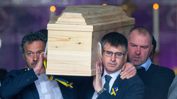 Pierre Zakrzewski's coffin is carried to Our Lady of Perpetual Help Church, Foxrock.  Zakrzewski's brother Greg is pictured at left.  Photography: Tom Honan
