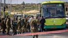 Israeli security forces at the scene of a stabbing attack by a Palestinian armed with a knife in a bus at the Gush Etzion settlement on Thursday.  Photograph: Yonatan Sindel/ EPA