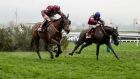  Cross Country Chase at Cheltenham. Jack Kennedy on Delta Work (right) with Davy Russell on Tiger Roll. Photograph: Dan Sheridan/Inpho