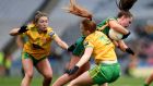 Meath’s Emma Duggan with Evelyn Mcginley and Tara Hegarty of DonegalM during the Division One final. Photograph: Tommy Grealy/Inpho