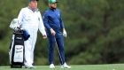 Tyrrell Hatton and his caddie Michael Donaghy during the third round of the Masters at Augusta National. Photograph: David Cannon/Getty Images