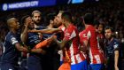 Players fight during the Uefa Champions League quarter final second leg football match between Club Atletico de Madrid and Manchester City. Photograph: Oscar del Pozo/AFP via Getty