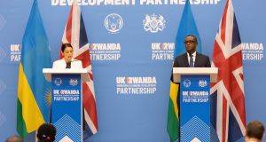  British home secretary Priti Patel with Rwandan foreign minister Vincent Biruta after signing the deal in Kigali on Thursday. Photograph: EPA