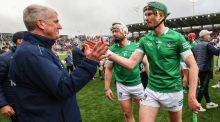 John Kiely congratulates William O’Donoghue after the victory over Cork at Páirc Uí Chaoimh.  Photograph: Bryan Keane/Inpho 