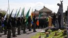 A Saoradh colour party is seen at the City Cemetery in Derry after marching from Free Derry corner as part of an event to mark the 1916 Easter Rising. Photograph: Liam McBurney/PA Wire